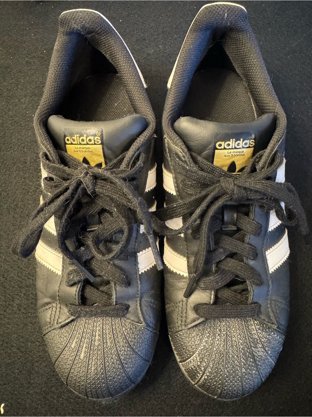adidas Women’s Superstars Black and White Retro Shell-Toe Sneakers